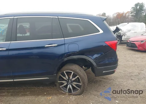 2021 Honda Pilot Awd Touring 8 Passenger z USA, uszkodzony, nr VIN 5FNYF6H94MB003272